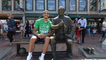 BOSTON, MA - AUGUST 24: Jayson Tatum #0 of the Boston Celtics takes a photo with a statue of Red Auerbach during a tour around Boston, Massachusetts on August 24, 2017. NOTE TO USER: User expressly acknowledges and agrees that, by downloading and/or using this photograph, user is consenting to the terms and conditions of the Getty Images License Agreement. Mandatory Copyright Notice: Copyright 2017 NBAE (Photo by Brian Babineau/NBAE via Getty Images)