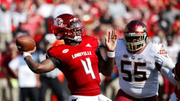 LOUISVILLE, KY - SEPTEMBER 29: Jawon Pass #4 of the Louisville Cardinals throws a pass against the Florida State Seminoles in the first quarter of the game at Cardinal Stadium on September 29, 2018 in Louisville, Kentucky. (Photo by Joe Robbins/Getty Images)