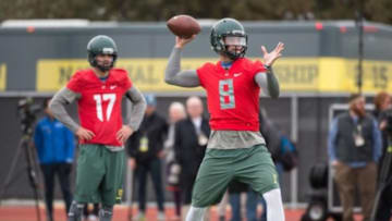 Jan 10, 2015; Euless, TX, USA; Oregon Ducks quarterback Jeff Lockie (17) and quarterback Marcus Mariota (8) during practice at the Euless Trinity High School football field. Mandatory Credit: Jerome Miron-USA TODAY Sports