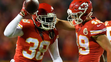 KANSAS CITY, MO - DECEMBER 16: Free safety Ron Parker #38 of the Kansas City Chiefs is congratulated by strong safety Daniel Sorensen #49 after an interception during the game against the Los Angeles Chargers at Arrowhead Stadium on December 16, 2017 in Kansas City, Missouri. (Photo by Peter Aiken/Getty Images)