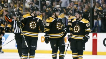 BOSTON, MA - APRIL 21: Boston's tip line of Boston Bruins center Patrice Bergeron (37), Boston Bruins right wing David Pastrnak (88) and Boston Bruins left wing Brad Marchand (63) skate out for a face off during Game 5 of the First Round for the 2018 Stanley Cup Playoffs between the Boston Bruins and the Toronto Maple Leafs on April 21, 2018, at TD Garden in Boston, Massachusetts. The Maple Leafs defeated the Bruins 4-3. (Photo by Fred Kfoury III/Icon Sportswire via Getty Images)