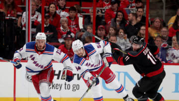 RALEIGH, NC - OCTOBER 07: Adam McQuaid #54 of the New York Rangers passes the puck during an NHL game against the Carolina Hurricanes on October 7, 2018 at PNC Arena in Raleigh, North Carolina. (Photo by Gregg Forwerck/NHLI via Getty Images)