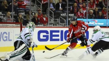 Nov 19, 2015; Washington, DC, USA; Washington Capitals center Jay Beagle (83) shoots the puck against Dallas Stars goalie Kari Lehtonen (32) during the first period at Verizon Center. Mandatory Credit: Brad Mills-USA TODAY Sports