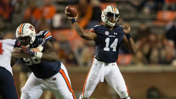 Auburn football quarterback Malik Willis (14) throws the ball against Liberty at Jordan-Hare Stadium in Auburn, Ala., on Saturday, Nov.. 17, 2018. Auburn defeated Liberty 53-0.