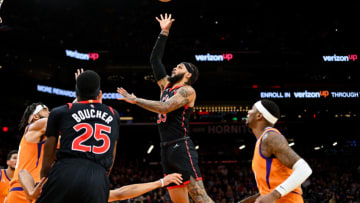 PHOENIX, ARIZONA - MARCH 11: Gary Trent Jr. #33 of the Toronto Raptors attempts a shot (Photo by Kelsey Grant/Getty Images)