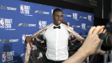 BROOKLYN, NY - JUNE 21: NBA Draft Prospect, Jaren Jackson Jr. shows off his suit on the Mountain Dew Kickstart Green Carpet at the 2018 NBA Draft on June 21, 2018 at the Barclays Center in Brooklyn, New York. NOTE TO USER: User expressly acknowledges and agrees that, by downloading and/or using this photograph, user is consenting to the terms and conditions of the Getty Images License Agreement. Mandatory Copyright Notice: Copyright 2018 NBAE (Photo by Jon Lopez/NBAE via Getty Images)