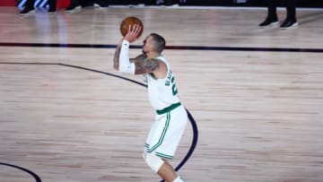 LAKE BUENA VISTA, FLORIDA - AUGUST 23: Daniel Theis #27 of the Boston Celtics makes a three point shot during the second quarter against the Philadelphia 76ers in Game Four of the first round of the playoffs at The Field House at ESPN Wide World Of Sports Complex on August 23, 2020 in Lake Buena Vista, Florida. NOTE TO USER: User expressly acknowledges and agrees that, by downloading and or using this photograph, User is consenting to the terms and conditions of the Getty Images License Agreement. (Photo by Kim Klement-Pool/Getty Images)