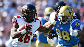 PASADENA, CA - OCTOBER 22: Utah (16) Cory Butler-Byrd (WR) stiff arms UCLA (98) Takkarist McKinley (DL) during an NCAA football game between the Utah Utes and the UCLA Bruins on October 22, 2016, at the Rose Bowl in Pasadena, CA. (Photo by Chris Williams/Icon Sportswire via Getty Images)