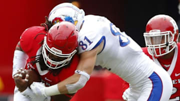 Sep 26, 2015; Piscataway, NJ, USA; Rutgers Scarlet Knights linebacker Kaiwan Lewis is tackled after intercepting a Kansas Jayhawks pass during the first half at High Points Solutions Stadium. Mandatory Credit: Noah K. Murray-USA TODAY Sports