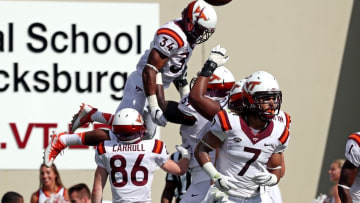 Sep 17, 2016; Blacksburg, VA, USA; Virginia Tech Hokies running back Travon McMillian (34) celebrates scoring a touchdown during the first quarter against the Boston College Eagles at Lane Stadium. Mandatory Credit: Peter Casey-USA TODAY Sports