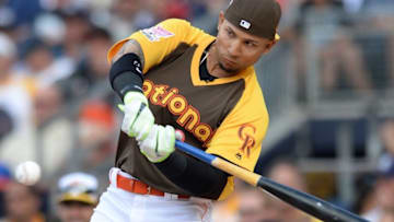 Jul 11, 2016; San Diego, CA, USA; National League outfielder Carlos Gonzalez (5) of the Colorado Rockies at bat during the All Star Game home run derby at PetCo Park. Mandatory Credit: Jake Roth-USA TODAY Sports
