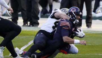 New Orleans Saints middle linebacker Alex Anzalone (47) makes a tackle on Chicago Bears quarterback Mitchell Trubisky (10) during the first quarter at Soldier Field. Mandatory Credit: Mike Dinovo-USA TODAY Sports