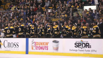 BOSTON - FEBRUARY 3: Boston Bruins players standing on the bench after it was announced that teammate defenseman Zdeno Chara (33) in playing in his 1,400 NHL game during action against the Toronto Maple Leafs during first period action at TD Garden in Boston on Feb. 3, 2018. (Photo by Matthew J. Lee/The Boston Globe via Getty Images)