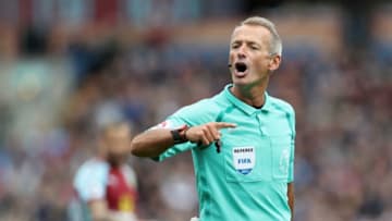 BURNLEY, ENGLAND - AUGUST 19: Referee Martin Atkinson gestures during the Premier League match between Burnley and West Bromwich Albion at Turf Moor on August 19, 2017 in Burnley, England. (Photo by Ian MacNicol/Getty Images)