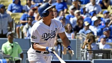 Oct 10, 2016; Los Angeles, CA, USA; Los Angeles Dodgers shortstop Corey Seager (5) hits an RBI double during the first inning against the Washington Nationals in game three of the 2016 NLDS playoff baseball series at Dodger Stadium. Mandatory Credit: Richard Mackson-USA TODAY Sports