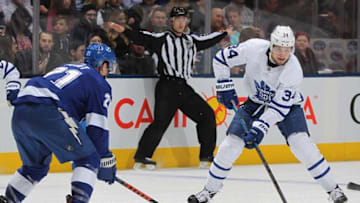 Auston Matthews #34 of the Toronto Maple Leafs gets set to step around Brayden Point #21 of the Tampa Bay Lightning for a goal during an NHL game at Scotiabank Arena. (Photo by Claus Andersen/Getty Images)