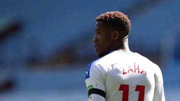BIRMINGHAM, ENGLAND - JULY 12: Wilfried Zaha of Crystal Palace looks on during the Premier League match between Aston Villa and Crystal Palace at Villa Park on July 12, 2020 in Birmingham, England. Football Stadiums around Europe remain empty due to the Coronavirus Pandemic as Government social distancing laws prohibit fans inside venues resulting in all fixtures being played behind closed doors. (Photo by Catherine Ivill/Getty Images)