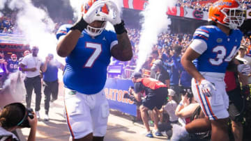 Florida Gators defensive lineman Chris McClellan (7) runs out of the tunnel with his team for the start of the game against Missouri at Steve Spurrier Field at Ben Hill Griffin Stadium in Gainesville, FL on Saturday, October 8, 2022. [Doug Engle/Gainesville Sun]Ncaa Football Florida Gators Vs Missouri Tigers