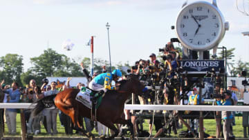 06 JUN 2015: American Pharoah with jockey Victor Espinoza aboard races to the finish line to win the 147th running of the Belmont Stakes and with it, Thoroughbred Racing's Triple Crown at Belmont Park in Hempstead, NY. (Photo by Cliff Welch/Icon Sportswire/Corbis via Getty Images)