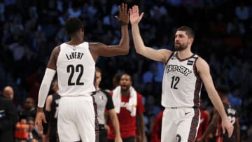 Caris LeVert #22 and Joe Harris #12 of the Brooklyn Nets in action against the Miami Heat at Barclays Center on January 10, 2020 in New York City. The Nets defeated the Heat 117-113.NOTE TO USER: User expressly acknowledges and agrees that, by downloading and or using this photograph, User is consenting to the terms and conditions of the Getty Images License Agreement. (Photo by Jim McIsaac/Getty Images)