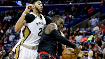 Jan 5, 2017; New Orleans, LA, USA; New Orleans Pelicans forward Anthony Davis (23) knocks the ball away from Atlanta Hawks forward Paul Millsap (4) on a fast break during the fourth quarter of a game at the Smoothie King Center. The Hawks defeated the Pelicans 99-94. Mandatory Credit: Derick E. Hingle-USA TODAY Sports
