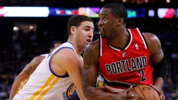 Jan 26, 2014; Oakland, CA, USA; Portland Trail Blazers guard Wesley Matthews (2) looks to shoot the ball while being defended by Golden State Warriors guard Klay Thompson (11) in the first quarter at Oracle Arena. Mandatory Credit: Cary Edmondson-USA TODAY Sports