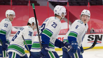 Mar 17, 2021; Ottawa, Ontario, CAN; Vancouver Canucks right wing Brock Boeser (6) celebrates his goal with his team in the first period against the Ottawa Senators at the Canadian Tire Centre. Mandatory Credit: Marc DesRosiers-USA TODAY Sports