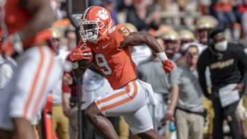 Travis Etienne rushed for 4,952 yards during his four seasons at Clemson.Ncaa Football Boston College At Clemson