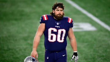 FOXBOROUGH, MASSACHUSETTS - DECEMBER 28: David Andrews #60 of the New England Patriots walks off the field after a 38-9 loss to the Buffalo Bills at Gillette Stadium on December 28, 2020 in Foxborough, Massachusetts. (Photo by Maddie Malhotra/Getty Images)