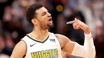 DENVER, CO - JANUARY 22: Jamal Murray #27 of the Denver Nuggets celebrates a three point basket to tie the Portland Trail Blazers late in the fourth quarter at the Pepsi Center on January 22, 2018 in Denver, Colorado. NOTE TO USER: User expressly acknowledges and agrees that, by downloading and or using this photograph, User is consenting to the terms and conditions of the Getty Images License Agreement. (Photo by Matthew Stockman/Getty Images)