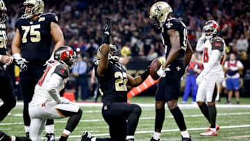 Dec 24, 2016; New Orleans, LA, USA; New Orleans Saints running back Mark Ingram (22) celebrates with wide receiver Michael Thomas (13) during the first quarter of a game against the Tampa Bay Buccaneers at the Mercedes-Benz Superdome. Mandatory Credit: Derick E. Hingle-USA TODAY Sports