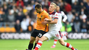 WOLVERHAMPTON, ENGLAND - OCTOBER 19: Jonny Otto of Wolverhampton Wanderers for possession with James Ward-Prowse of Southampton during the Premier League match between Wolverhampton Wanderers and Southampton FC at Molineux on October 19, 2019 in Wolverhampton, United Kingdom. (Photo by Nathan Stirk/Getty Images)