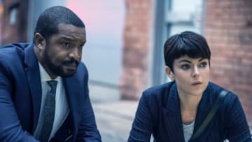 Coroner -- "Quick or Dead" -- Image Number: COR104_1003r.jpg -- Pictured (L-R): Roger Cross as Detective Donovan "Mac" McAvoy and Serinda Swan as Dr. Jenny Cooper -- Photo: © 2020 Muse Entertainment Enterprises, Inc.