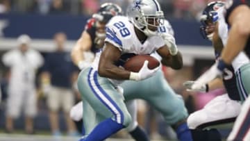 Oct 5, 2014; Arlington, TX, USA; Dallas Cowboys running back DeMarco Murray (29) runs with the ball against the Houston Texans at AT&T Stadium. The Cowboys beat the Texans 20-17 in overtime. Mandatory Credit: Matthew Emmons-USA TODAY Sports