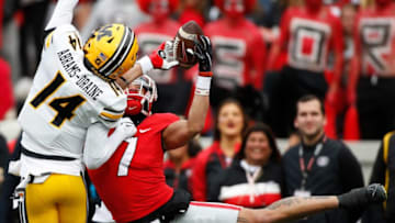 Georgia wide receiver Jermaine Burton (7) brings in a pass from Georgia quarterback Stetson Bennett (13) while being defended by Missouri defensive back Kris Abrams-Draine (14) during the first half of a NCAA college football game between Missouri and Georgia in Athens, Ga., on Saturday, Nov. 6, 2021. Georgia won 43-6.News Joshua L Jones