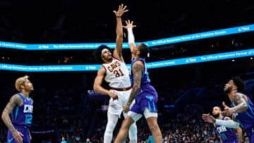 CHARLOTTE, NORTH CAROLINA - FEBRUARY 04: Jarrett Allen #31 of the Cleveland Cavaliers shoots over P.J. Washington #25 of the Charlotte Hornets during the first half of their game at Spectrum Center on February 04, 2022 in Charlotte, North Carolina. NOTE TO USER: User expressly acknowledges and agrees that, by downloading and or using this photograph, User is consenting to the terms and conditions of the Getty Images License Agreement. (Photo by Grant Halverson/Getty Images)