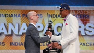 Jun 25, 2015; Brooklyn, NY, USA; Myles Turner (Texas) greets NBA commissioner Adam Silver after being selected as the number eleven overall pick to the Indiana Pacers in the first round of the 2015 NBA Draft at Barclays Center. Mandatory Credit: Brad Penner-USA TODAY Sports