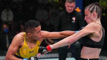 LAS VEGAS, NEVADA - AUGUST 21: (L-R) Josiane Nunes of Brazil punches Bea Malecki of Sweden in a bantamweight fight during the UFC Fight Night event at UFC APEX on August 21, 2021 in Las Vegas, Nevada. (Photo by Chris Unger/Zuffa LLC)