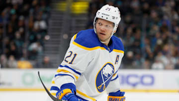 SEATTLE, WASHINGTON - NOVEMBER 04: Kyle Okposo #21 of the Buffalo Sabres looks on against the Seattle Kraken on November 04, 2021 at Climate Pledge Arena in Seattle, Washington. (Photo by Steph Chambers/Getty Images)