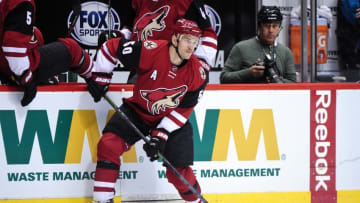 Mar 17, 2016; Glendale, AZ, USA; Arizona Coyotes center Antoine Vermette (50) looks to pass during the second period against the San Jose Sharks at Gila River Arena. Mandatory Credit: Matt Kartozian-USA TODAY Sports