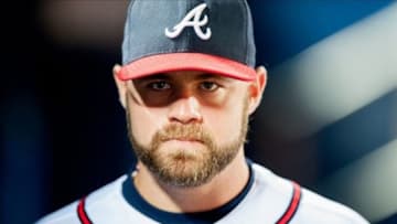 Aug 13, 2013; Atlanta, GA, USA; Atlanta Braves catcher Evan Gattis (24) in the dugout against the Philadelphia Phillies at Turner Field. Mandatory Credit: Kevin Liles-USA TODAY Sports