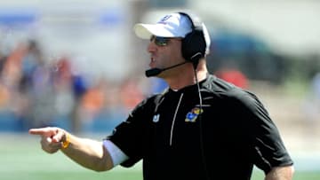 LAWRENCE, KS - SEPTEMBER 10: Head coach David Beaty of the Kansas Jayhawks tries to get an officials attention after a penalty in the first quarter against the Ohio Bobcats at Memorial Stadium on September 10, 2016 in Lawrence, Kansas. (Photo by Ed Zurga/Getty Images)
