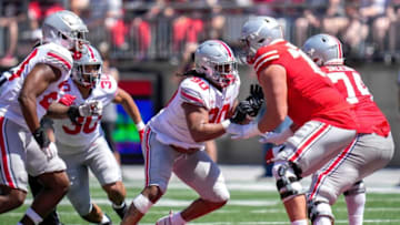 Apr 15, 2023; Columbus, Ohio, United States; Ohio State Buckeyes defensive tackle Jaden McKenzie (90) lines up with Ohio State Buckeyes offensive lineman Donovan Jackson (74) during the second quarter of the Ohio State Buckeyes spring game at Ohio Stadium on Saturday morning. Mandatory Credit: Joseph Scheller-The Columbus DispatchFootball Ceb Osufb Spring Game Ohio State At Ohio State