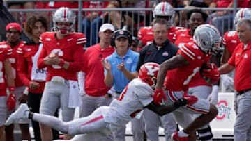 Sept. 9, 2023; Columbus, Oh., USA; DUPLICATE***Ohio State Buckeyes wide receiver Carnell Tate is tackled by Youngstown State Penguins defensive back Marcus Hooker (23) during the second half of Saturday's NCAA Division I football game at Ohio Stadium.