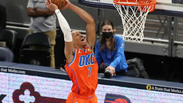 Darius Bazley #7 of the Oklahoma City Thunder dunks the ball against the Indiana Pacers at Bankers Life Fieldhouse on April 21, 2021 in Indianapolis, Indiana. NOTE TO USER: User expressly acknowledges and agrees that, by downloading and or using this Photograph, user is consenting to the terms and conditions of the Getty Images License Agreement. (Photo by Andy Lyons/Getty Images)