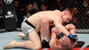 VANCOUVER, BRITISH COLUMBIA - SEPTEMBER 14: (L-R) Jimmy Crute of Australia punches Misha Cirkunov of Latvia in their light heavyweight bout during the UFC Fight Night event at Rogers Arena on September 14, 2019 in Vancouver, Canada. (Photo by Jeff Bottari/Zuffa LLC/Zuffa LLC)