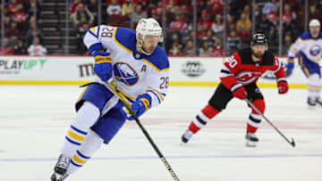 Apr 21, 2022; Newark, New Jersey, USA; Buffalo Sabres left wing Zemgus Girgensons (28) skates with the puck against the New Jersey Devils during the first period at Prudential Center. Mandatory Credit: Ed Mulholland-USA TODAY Sports