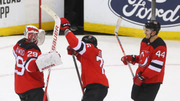 Feb 16, 2020; Newark, New Jersey, USA; New Jersey Devils goaltender Mackenzie Blackwood (29), defenseman P.K. Subban (76), and left wing Miles Wood (44) celebrate their win over the Columbus Blue Jackets at Prudential Center. Mandatory Credit: Ed Mulholland-USA TODAY Sports