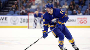 Mar 7, 2022; Buffalo, New York, USA; Buffalo Sabres center Dylan Cozens (24) looks to make a pass during the second period against the Florida Panthers at KeyBank Center. Mandatory Credit: Timothy T. Ludwig-USA TODAY Sports
