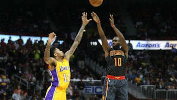 Nov 2, 2016; Atlanta, GA, USA; Atlanta Hawks guard Tim Hardaway Jr. (10) attempts a three-point basket against Los Angeles Lakers forward Brandon Ingram (14) in the fourth quarter of their game at Philips Arena. The Lakers won 123-116. Mandatory Credit: Jason Getz-USA TODAY Sports